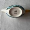 stempel van Gien France Magellan gegarandeerd vaatwasmachinebestendig onderop een vintage sauskom.